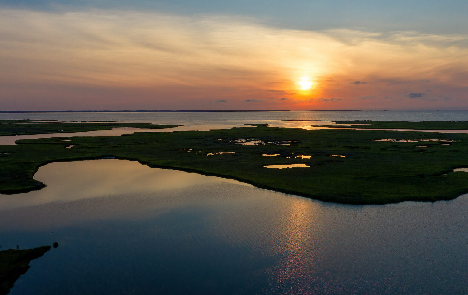 The sun rises over the Guinea Marsh Islands